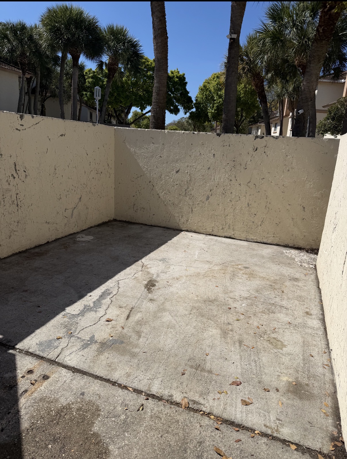Apartment complex parking lot cleared after Junk Force bulk waste removal Palm Beach County FL