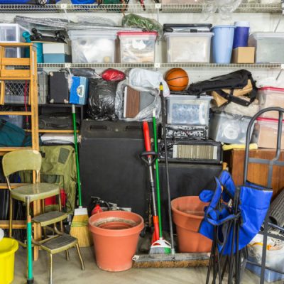 Messy,Cluttered,Garage,Filled,With,Various,Household,Storage,Items.